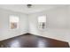 This bedroom features hardwood floors and windows for plenty of natural light at 3636 Lasalle St, Indianapolis, IN 46218