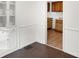 Bright dining room featuring refinished hardwood floors, and a view into kitchen area at 3636 Lasalle St, Indianapolis, IN 46218
