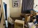 A bedroom with a speed limit sign and various items at 3728 Orchard Ave, Indianapolis, IN 46218