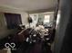 A living room filled with clutter at 3728 Orchard Ave, Indianapolis, IN 46218