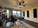 Bright music room with hardwood floors, natural light, and keyboard at 3965 N Meridian St # 7D, Indianapolis, IN 46208