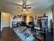 Inviting music room with natural light, hardwood floors and ample storage at 3965 N Meridian St # 7D, Indianapolis, IN 46208