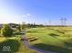 Beautiful aerial view of the green golf course with gently sloping hills on a bright sunny day at 5021 Greenside Dr, Indianapolis, IN 46235