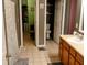 Functional bathroom showcasing vanity, toilet, and shower with neutral color tones at 5021 Greenside Dr, Indianapolis, IN 46235