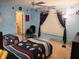Cheerful bedroom with two beds, sports-themed decor, and plenty of natural light at 5021 Greenside Dr, Indianapolis, IN 46235