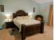 Beautiful bedroom with a decorative bed, bedside tables, and inviting decor elements at 5021 Greenside Dr, Indianapolis, IN 46235