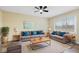 Cozy living room featuring two sofas, a large window for natural light, and stylish decor at 5441 E 34Th St, Indianapolis, IN 46218