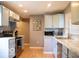 Modern kitchen featuring stainless steel appliances and sleek countertops at 621 W 10Th St, Indianapolis, IN 46202