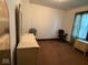 This bedroom features carpet flooring and neutral colored walls at 637 N Oakland Ave, Indianapolis, IN 46201