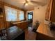 Cozy kitchen with wood cabinets, laminate countertops, and a ceiling fan at 637 N Oakland Ave, Indianapolis, IN 46201