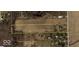 Aerial view of a large vacant land lot ready for development, surrounded by trees and farmland with utilities nearby at 6629 N 600 W, Fairland, IN 46126