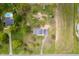 Aerial view of property featuring a home, in-ground pool, and a long driveway at 6629 N 600 W, Fairland, IN 46126