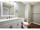 Neutral bathroom featuring a white vanity with matte black hardware and modern fixtures at 6629 N 600 W, Fairland, IN 46126