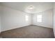 Bright bedroom with fresh carpet and two double hung windows for plenty of natural light at 6629 N 600 W, Fairland, IN 46126