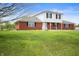 Charming two-story home featuring a well-maintained lawn and inviting curb appeal at 6629 N 600 W, Fairland, IN 46126