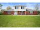 Charming two-story home featuring a well-maintained lawn and inviting curb appeal at 6629 N 600 W, Fairland, IN 46126