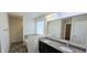This bathroom has double sinks, granite countertop, and soaking tub at 7027 Pinnacle Dr, Columbus, IN 47201