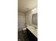 Neat bathroom featuring shower over tub, new fixtures and a clean vanity at 7027 Pinnacle Dr, Columbus, IN 47201