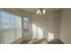 Sun-drenched dining room featuring large windows and neutral wall color at 7027 Pinnacle Dr, Columbus, IN 47201