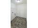 Bright laundry room has tile floors and utility connections at 7027 Pinnacle Dr, Columbus, IN 47201