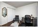 The bedroom includes a desk space, rocking chair, sliding closet and a decorative mirror at 7459 Quincy Ct, Indianapolis, IN 46254