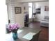 Open concept living area with fireplace, natural light, dining area, and comfortable couch at 7459 Quincy Ct, Indianapolis, IN 46254