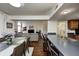 The modern home features an open floor plan including living room, dining area, kitchen, and staircase at 7459 Quincy Ct, Indianapolis, IN 46254