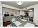 An open floor plan integrates the living room, dining area, and kitchen, enhancing the sense of space and connection at 7459 Quincy Ct, Indianapolis, IN 46254