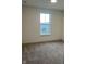 Cozy bedroom with neutral carpet and a large window providing natural light at 780 James William Ln, Westfield, IN 46074