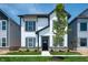 Attractive two-story home with white siding, gray trim, a well-manicured lawn and inviting curb appeal at 780 James William Ln, Westfield, IN 46074