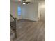 Well-lit living room with hardwood floors, neutral walls, and an airy atmosphere at 780 James William Ln, Westfield, IN 46074