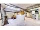 Large basement with garage door and ample room for workshop or storage at 8937 W 800 N, Indianapolis, IN 46259