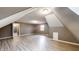 Bonus room featuring modern gray vinyl floors and a large window at 8937 W 800 N, Indianapolis, IN 46259