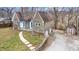 Charming stone home with a well-manicured yard and a convenient two-car garage at 8937 W 800 N, Indianapolis, IN 46259