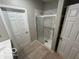 Bathroom featuring a modern shower with glass doors at 1007 N 10Th St, Elwood, IN 46036