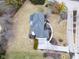Aerial view of a home with a backyard deck and a circular driveway at 12878 Mayfair Ln, Carmel, IN 46032
