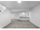 Finished basement featuring carpet, stairs, and a bar for entertainment at 12878 Mayfair Ln, Carmel, IN 46032