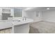 Finished basement featuring a wet bar area with modern fixtures and cabinetry at 12878 Mayfair Ln, Carmel, IN 46032