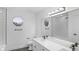 Bathroom features double sinks, modern hardware, and large mirror at 12878 Mayfair Ln, Carmel, IN 46032