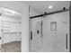 Modern bathroom featuring a glass-enclosed shower, sleek black hardware, and neutral, clean finishes at 12878 Mayfair Ln, Carmel, IN 46032