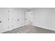 Bright bedroom features neutral carpet, fresh paint and double closets at 12878 Mayfair Ln, Carmel, IN 46032
