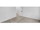 Bedroom with neutral walls, carpet, and a door looking out to the staircase at 12878 Mayfair Ln, Carmel, IN 46032