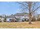 Beautifully maintained two-story home presents a welcoming front yard and architectural charm at 12878 Mayfair Ln, Carmel, IN 46032