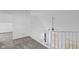 Hallway features neutral carpet, fresh paint, and bright lighting at 12878 Mayfair Ln, Carmel, IN 46032