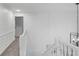 Open hallway features neutral carpet, fresh paint, and bright modern lighting at 12878 Mayfair Ln, Carmel, IN 46032