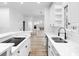 Modern kitchen featuring white cabinets, stainless steel appliances, and an open design concept at 12878 Mayfair Ln, Carmel, IN 46032