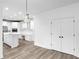 Bright, open kitchen features modern appliances and a large island, perfect for entertaining at 12878 Mayfair Ln, Carmel, IN 46032