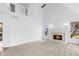 Bright living room with fireplace and windows at 12878 Mayfair Ln, Carmel, IN 46032