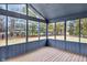 The light wood flooring of this screened-in porch makes it a very relaxing space at 12878 Mayfair Ln, Carmel, IN 46032
