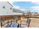 An inviting back deck with patio furniture is perfect for outdoor dining and gatherings at 14402 Wolverton Way, Fishers, IN 46037